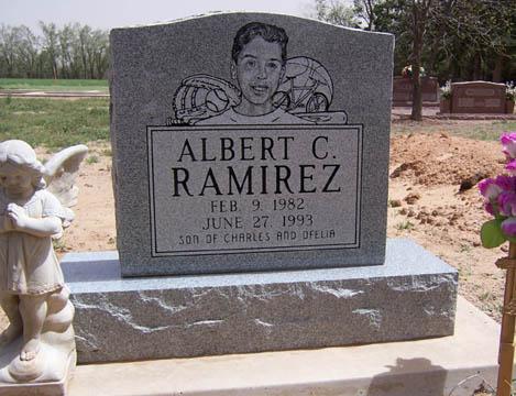 grey granite memorial for Albert Ramierez