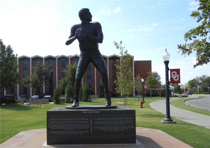 Sam Bradford statue base in Heisman Park at Oklahoma University